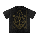 Black t-shirt with gold geometric design on a white background
