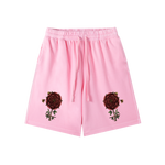 Detail of Latin motto Dat Rosa Mel Apibus on mystical clothing shorts